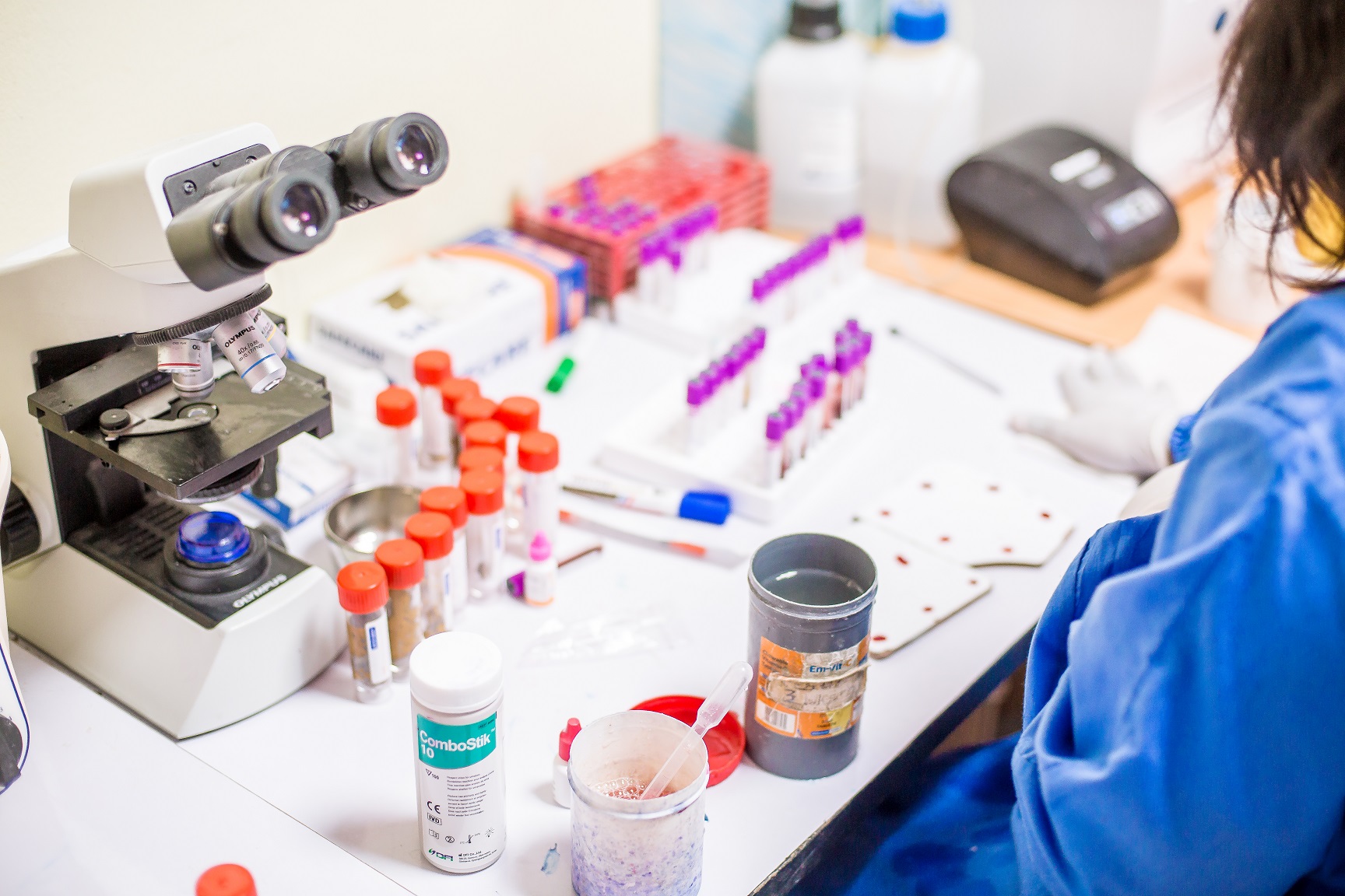Limi laboratory professional working with diagnostic samples